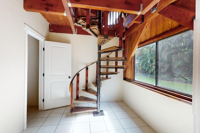 staircase with tile patterned floors