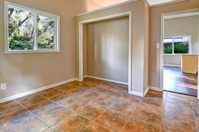 unfurnished bedroom featuring a closet