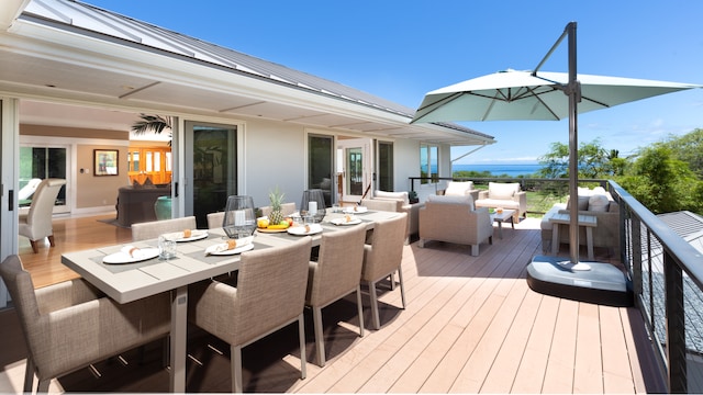 wooden deck featuring an outdoor hangout area