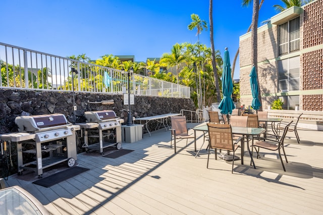 wooden terrace with area for grilling