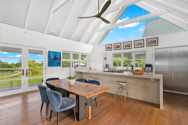 interior space featuring french doors, ceiling fan, sink, wooden ceiling, and vaulted ceiling with beams