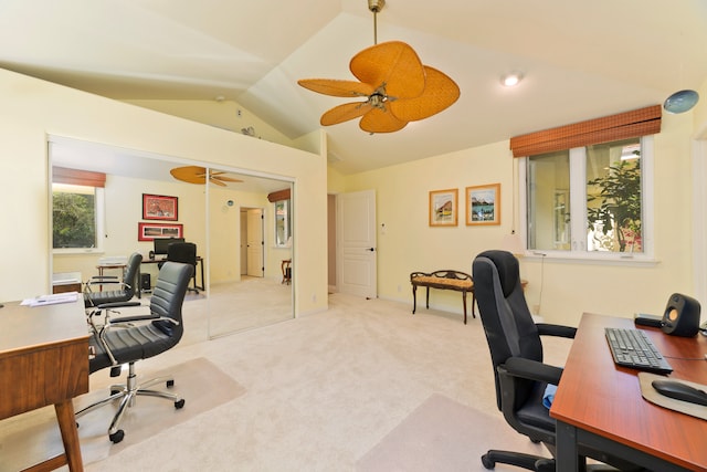 office space with light colored carpet, vaulted ceiling, and ceiling fan