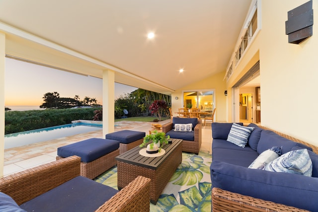 patio terrace at dusk with outdoor lounge area