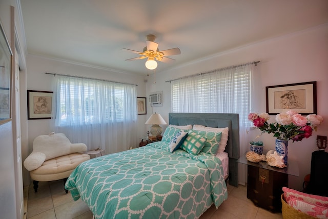 tiled bedroom featuring ceiling fan and crown molding