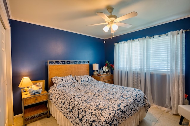 tiled bedroom featuring ceiling fan and ornamental molding