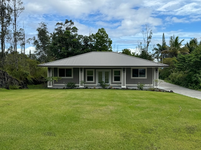 view of front of home with a porch and a front lawn