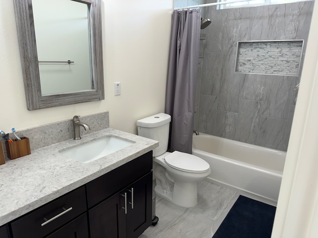 full bathroom featuring shower / tub combo, vanity, and toilet