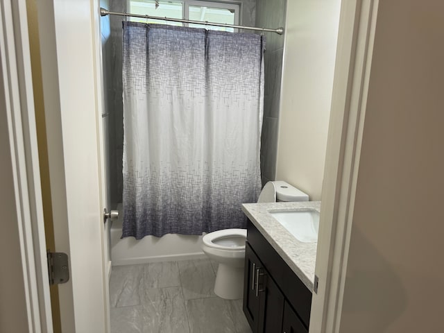 full bathroom featuring vanity, toilet, and shower / bath combo with shower curtain