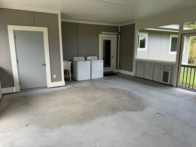 exterior space with washing machine and dryer