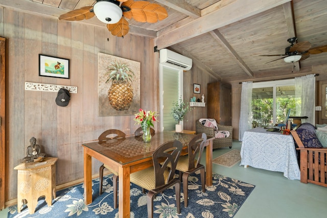 dining area with a wall mounted air conditioner, wood walls, and concrete flooring