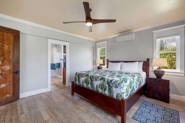 bedroom featuring hardwood / wood-style flooring, ceiling fan, a wall unit AC, and multiple windows