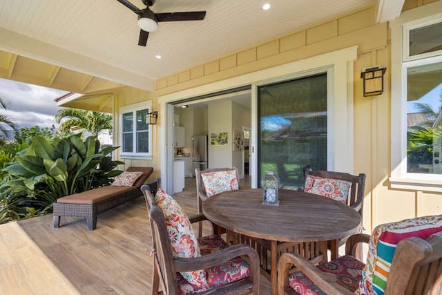 exterior space featuring ceiling fan