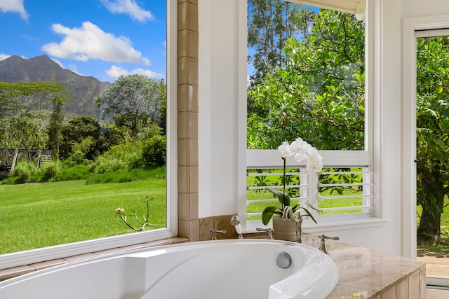 bathroom with a mountain view