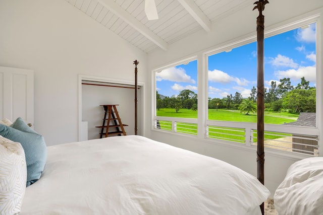 bedroom featuring vaulted ceiling with beams, multiple windows, wooden ceiling, and ceiling fan