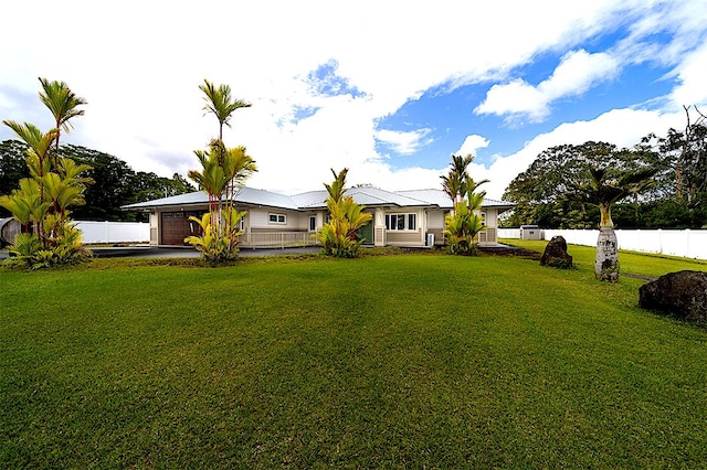 view of yard with a garage