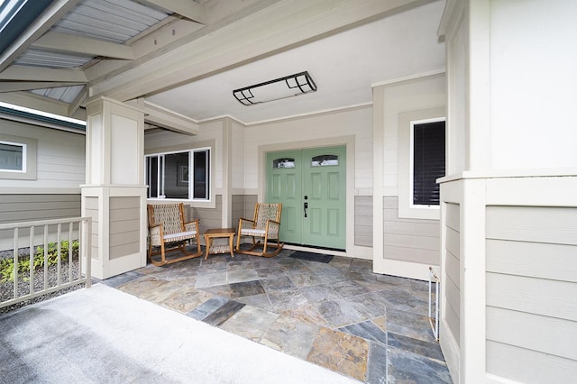 doorway to property with covered porch