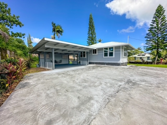 view of front of property with a carport