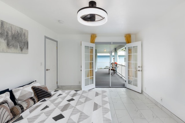 unfurnished bedroom featuring french doors