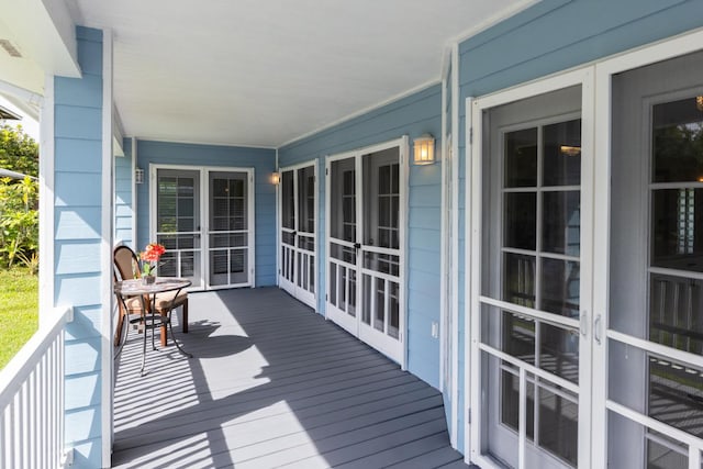 wooden deck featuring a porch