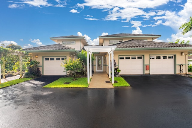 view of front of property with a garage