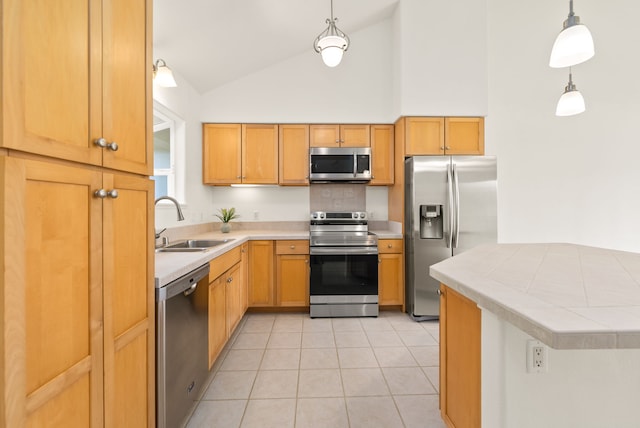 kitchen featuring sink, stainless steel appliances, high vaulted ceiling, pendant lighting, and light tile patterned floors