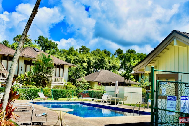 view of swimming pool featuring a patio area