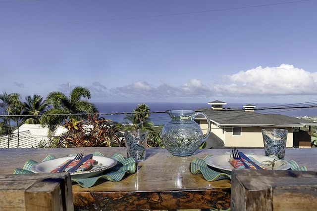 view of patio featuring a water view