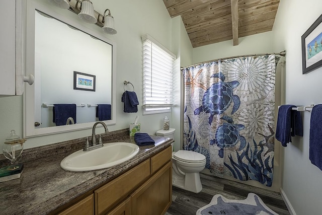 bathroom with vaulted ceiling with beams, hardwood / wood-style floors, toilet, vanity, and wood ceiling