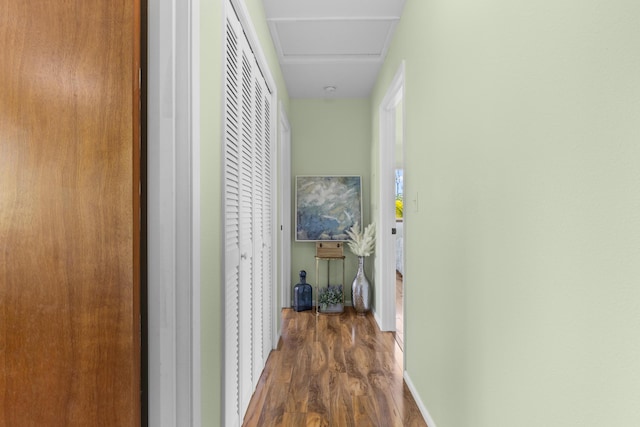 corridor featuring dark hardwood / wood-style floors