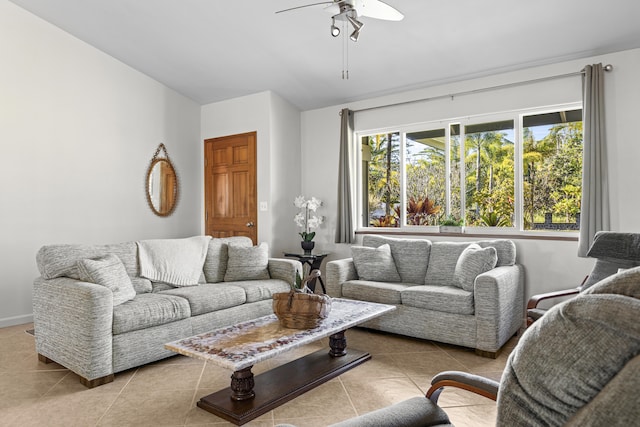 tiled living room with ceiling fan