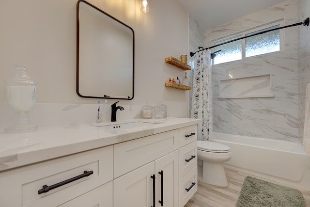 full bathroom featuring vanity, shower / bathtub combination with curtain, wood-type flooring, and toilet