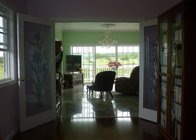 dining room featuring a wealth of natural light and a chandelier