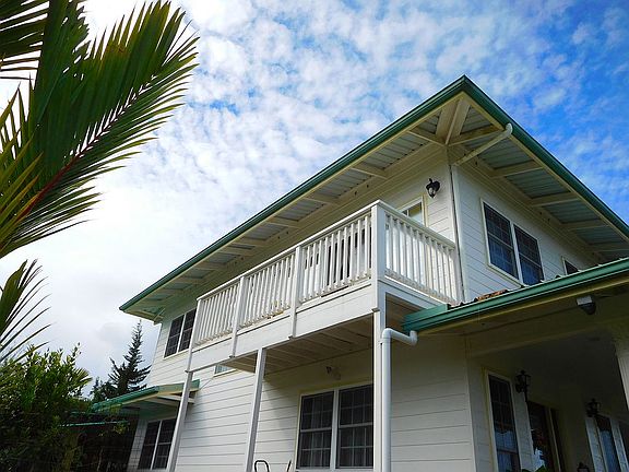 view of home's exterior featuring a balcony