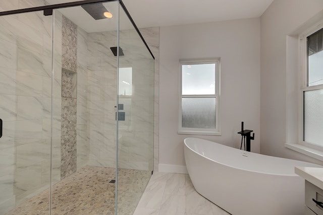 bathroom featuring vanity and plus walk in shower