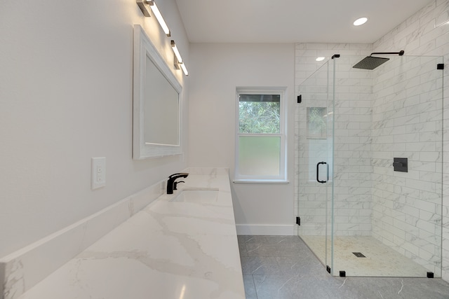 bathroom featuring vanity and walk in shower