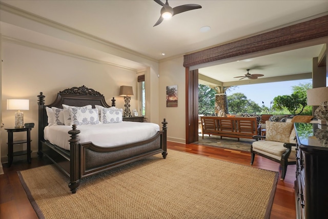 bedroom with ceiling fan, ornamental molding, and hardwood / wood-style flooring