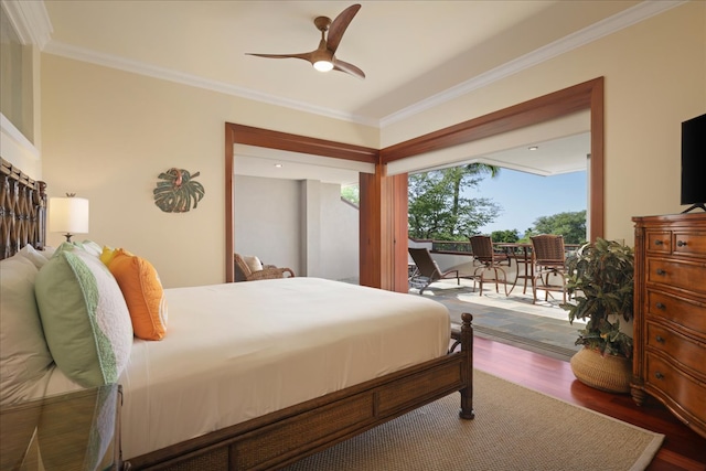 bedroom featuring hardwood / wood-style flooring, ceiling fan, access to exterior, and ornamental molding