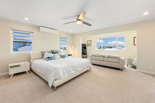 carpeted bedroom with multiple windows, an AC wall unit, and ceiling fan