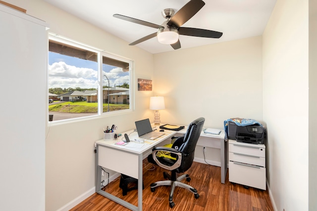 office featuring dark hardwood / wood-style flooring and ceiling fan