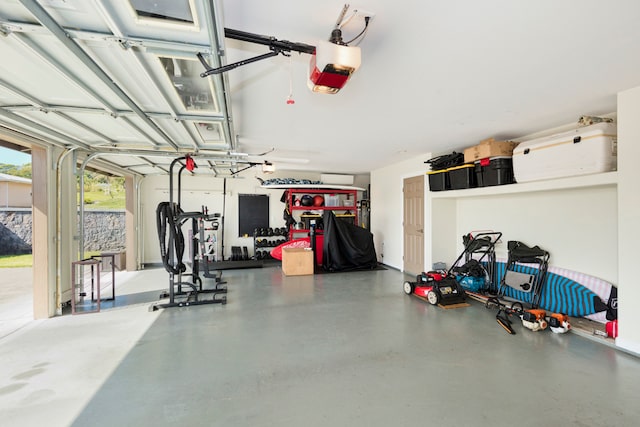 garage featuring a garage door opener