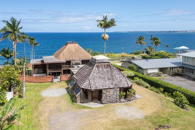 exterior space with a water view