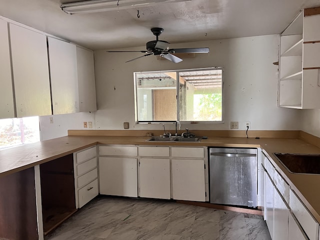 kitchen with white cabinets, ceiling fan, stainless steel dishwasher, and sink