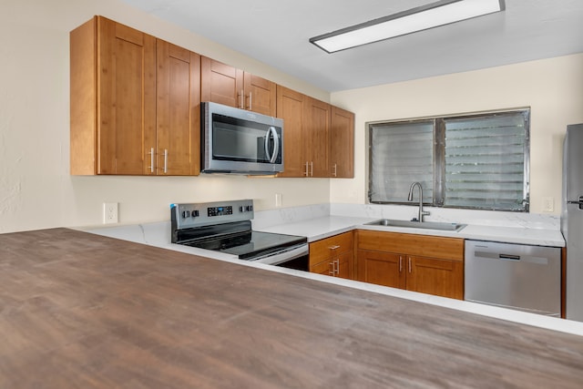 kitchen featuring sink and appliances with stainless steel finishes