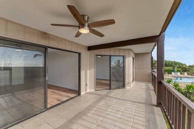 balcony featuring ceiling fan