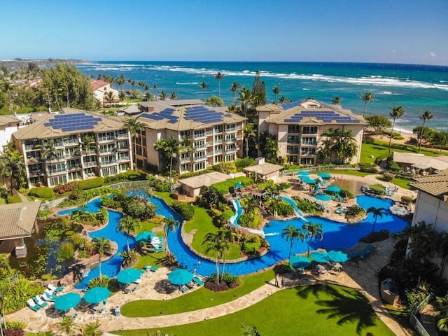 birds eye view of property featuring a water view