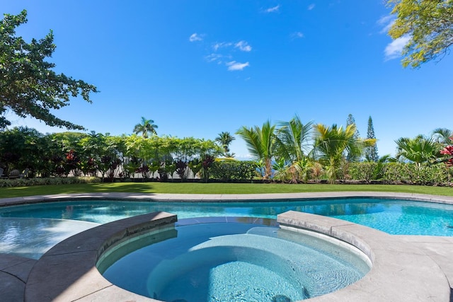 view of pool with an in ground hot tub