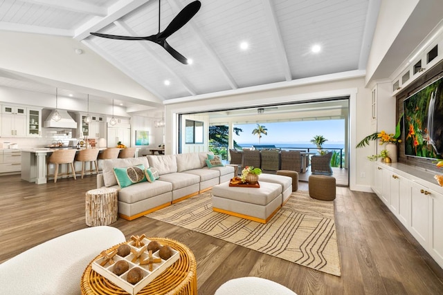 living room with beam ceiling, dark hardwood / wood-style flooring, high vaulted ceiling, and ceiling fan