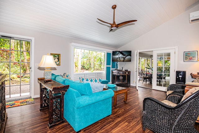 living room featuring ceiling fan, french doors, dark wood-type flooring, an AC wall unit, and lofted ceiling