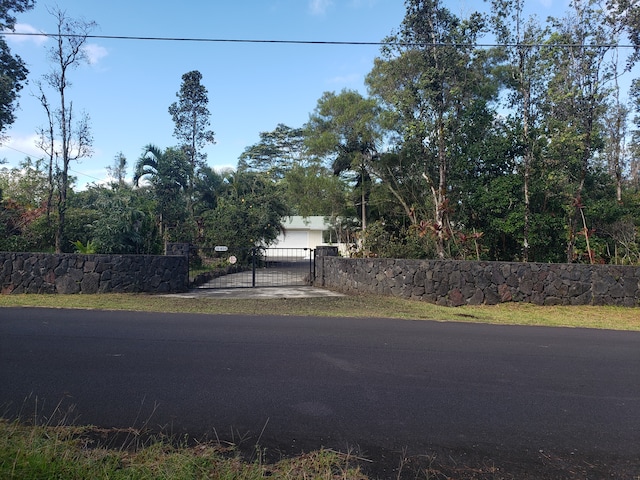 view of street with a gate