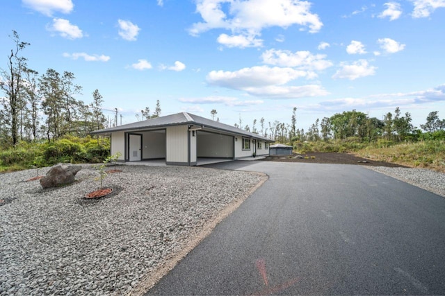 exterior space with a garage